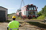 Lossing av svillepakkemaskin <br> Unloading of Track Laying Machine